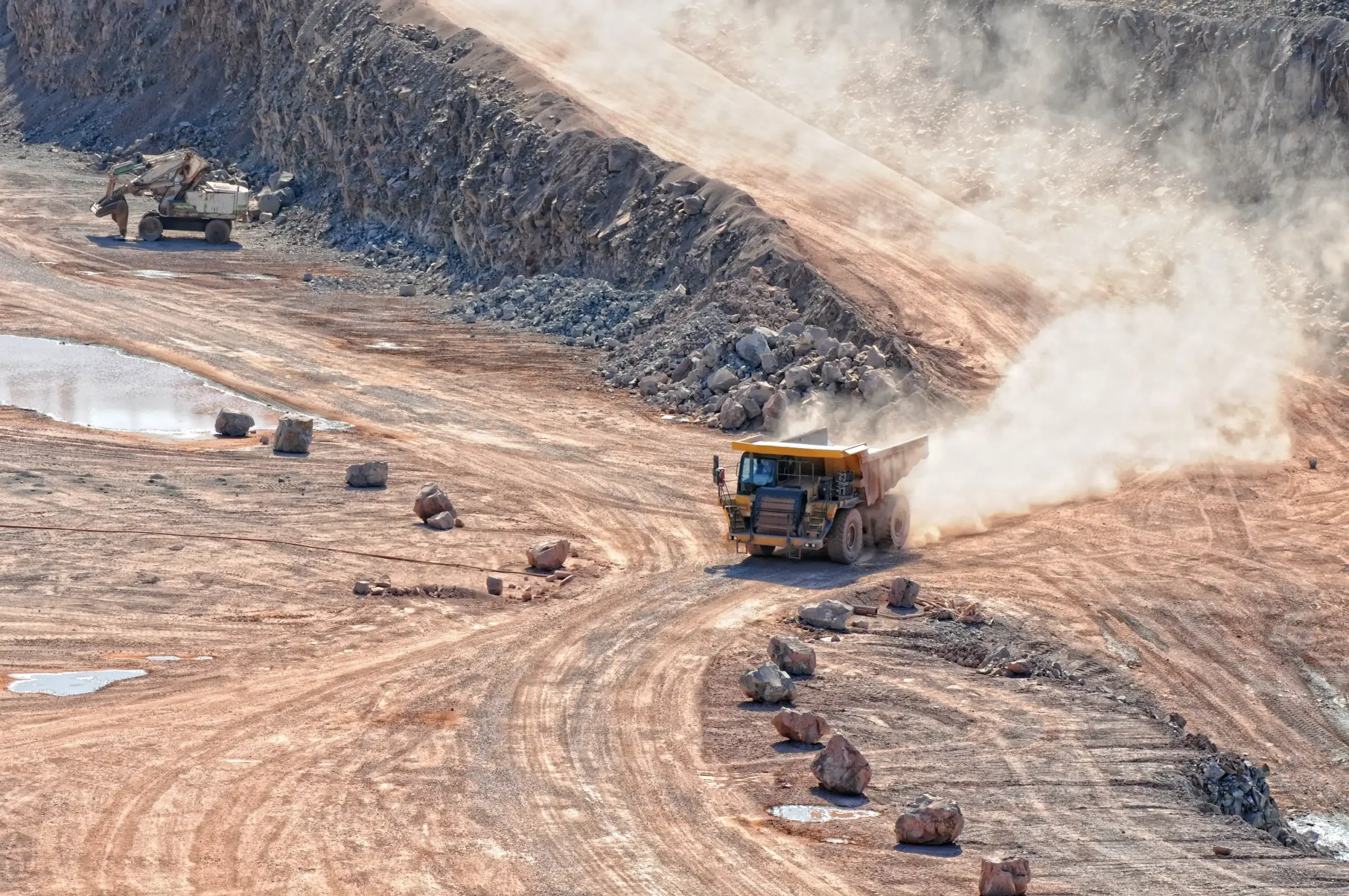 dumper-truck-driving-in-an-active-quarry-mine-of-p-2024-11-28-15-09-34-utc